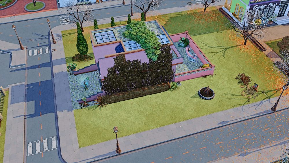 A pink modern house covered in ivy