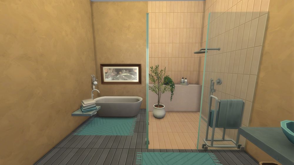 a Sims 4 bathroom done in terracotta and teal colours. There's a bathtub on the left with a floating shelf on which is a folded stack of towels. A painting is hung on the wall over the tub. On the right is a shower room with a potted olive tree.
