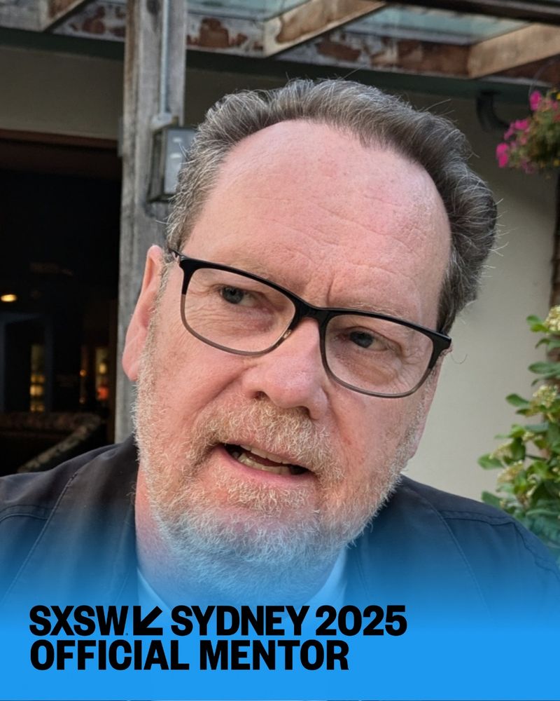 Picture of Jon Cartwright wearing glasses looking to the left of the frame. Text reads SWSW Sydney 2025 - Official Mentor