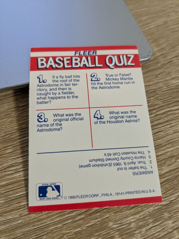 1990 Fleer "Action Series" card with quiz questions about the Houston Astros