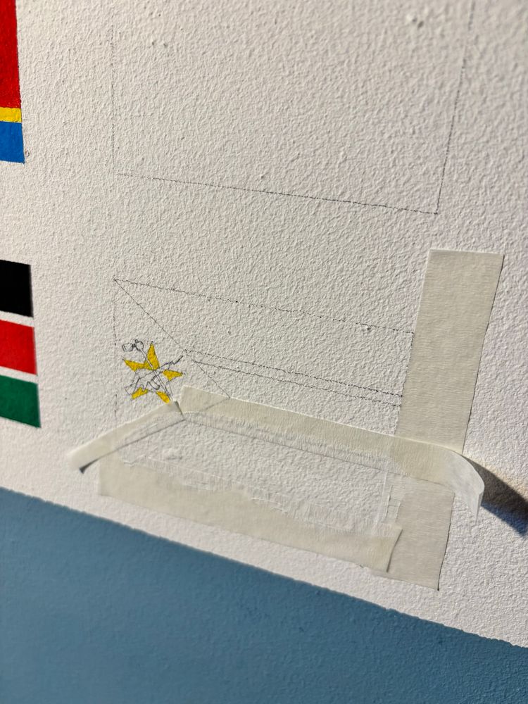 Pencil outline of the flag of Mozambique on the wall