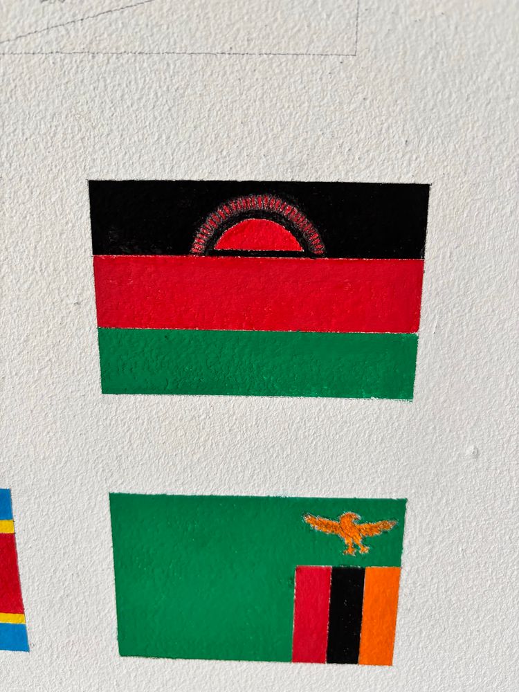 Finished flag of Malawi, hand-painted on a wall