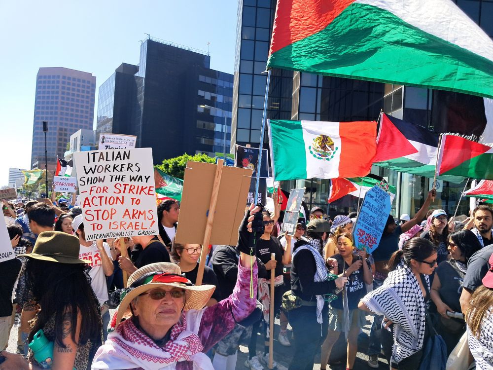 Los Angeles Westwood neighborhood, Saturday, October 4th, 2025. Wilshire boulevard March for Gaza to end anti-Palestinian genocide. More than a thousand people waving Palestinian flags marching in the street. 