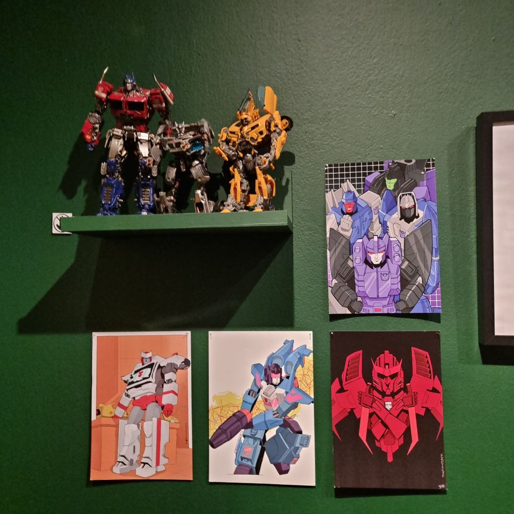 And the last four prints, thematically grouped with some 2007 movie toys that were not mine.