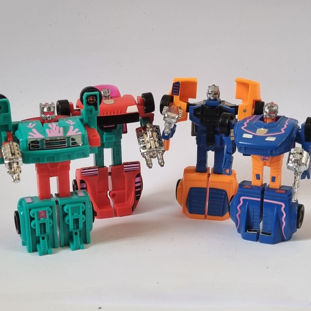 Axelerators: Robot mode. From left - Hotrider, Rapido, Windbreaker and Skram.