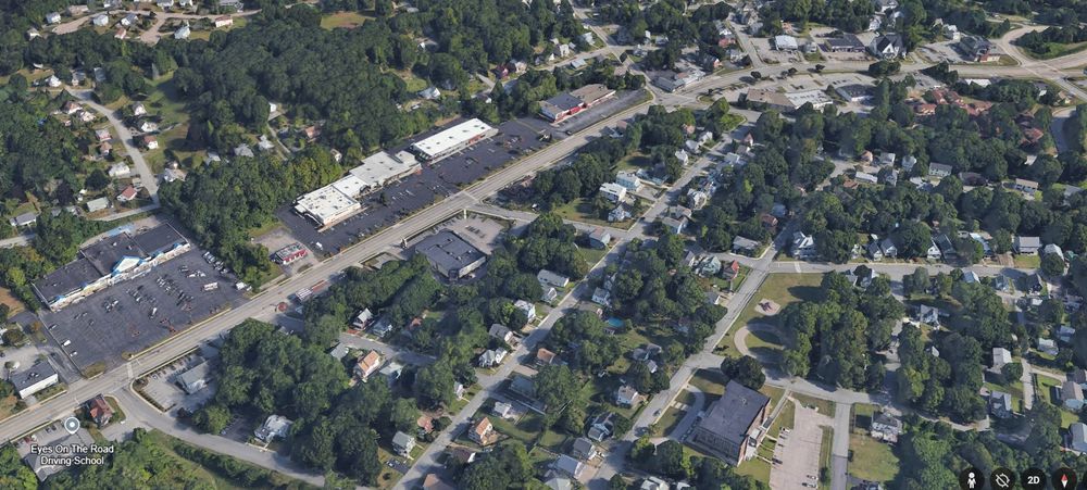 Norwich westside with large parking lot retail commercial stretched over a half mile