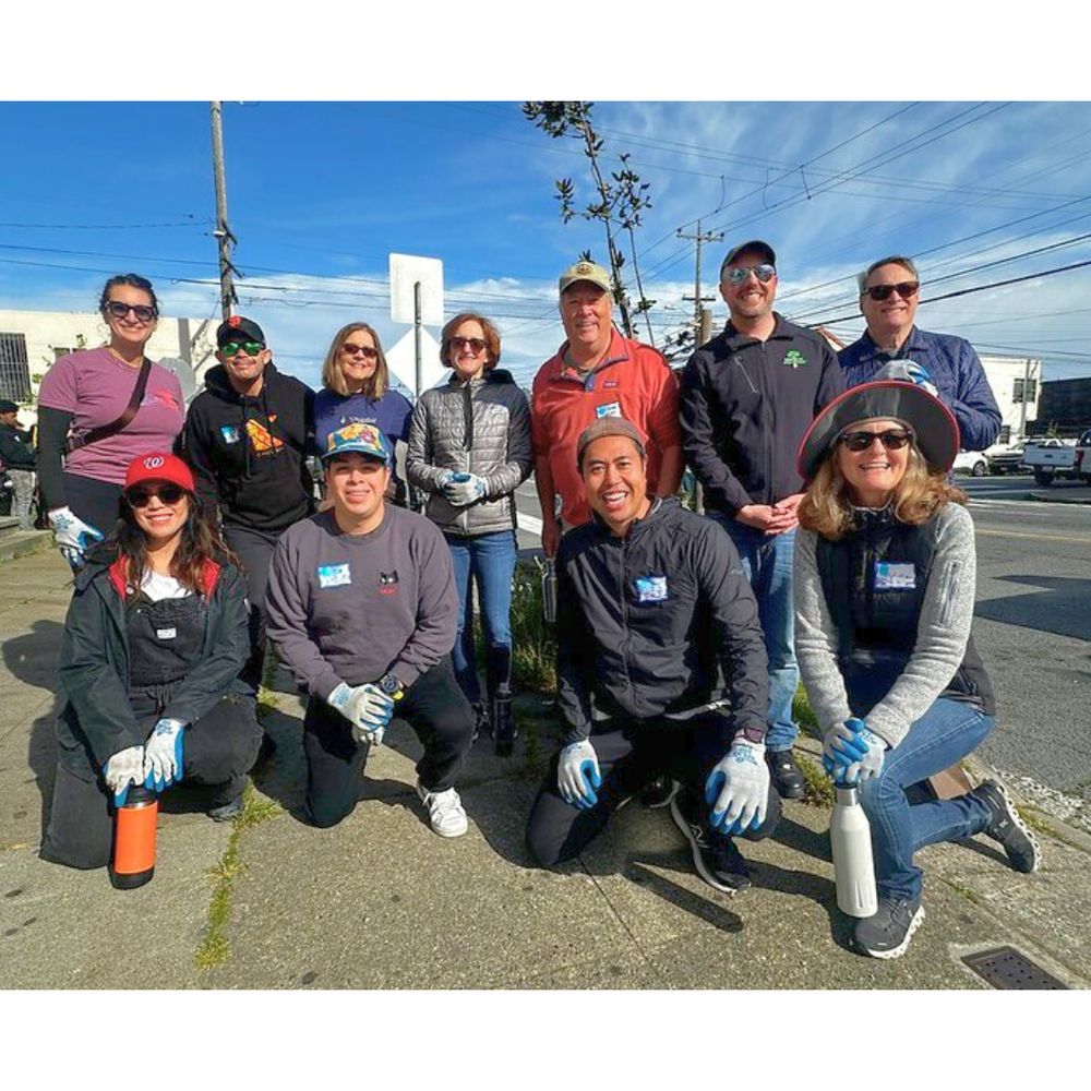 Group photo of 11 volunteers and staff members.
