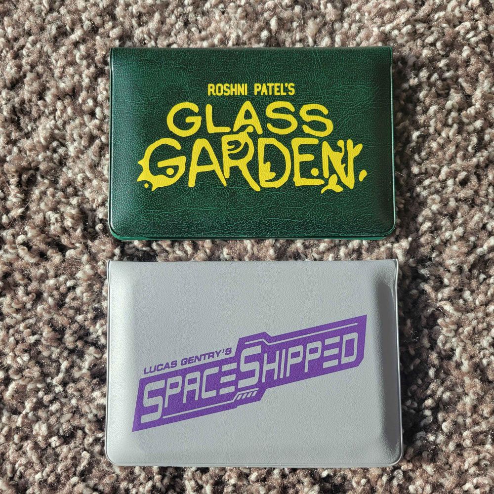 Photo of two Buttonshy game cases, Glass Gardens from Roshni Patel and Space Shipped from Lucas Gentry