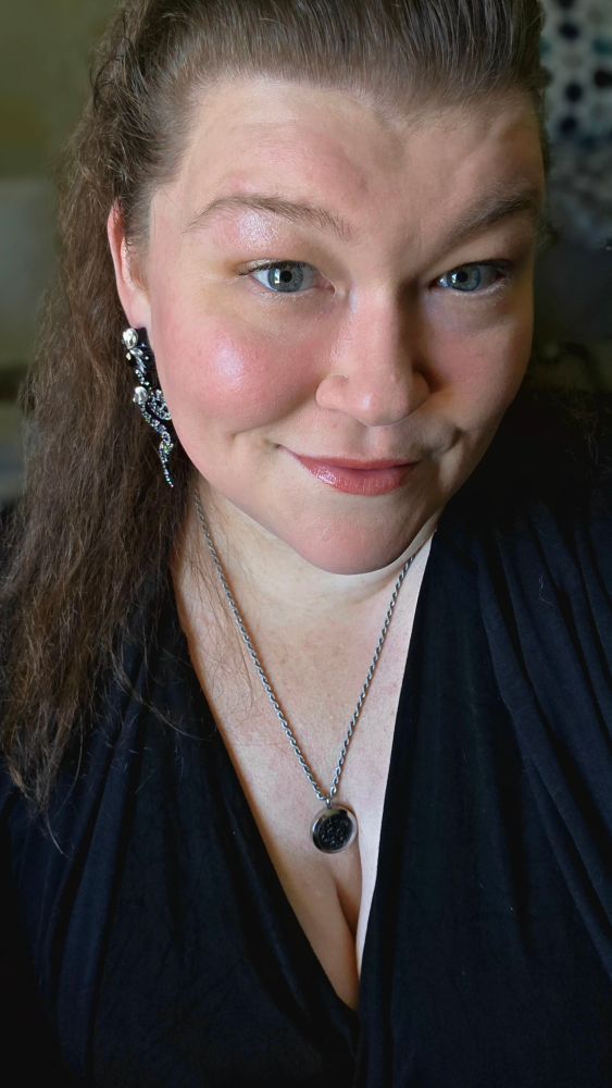 42nd birthday selfie. The snake earrings are fantastic.