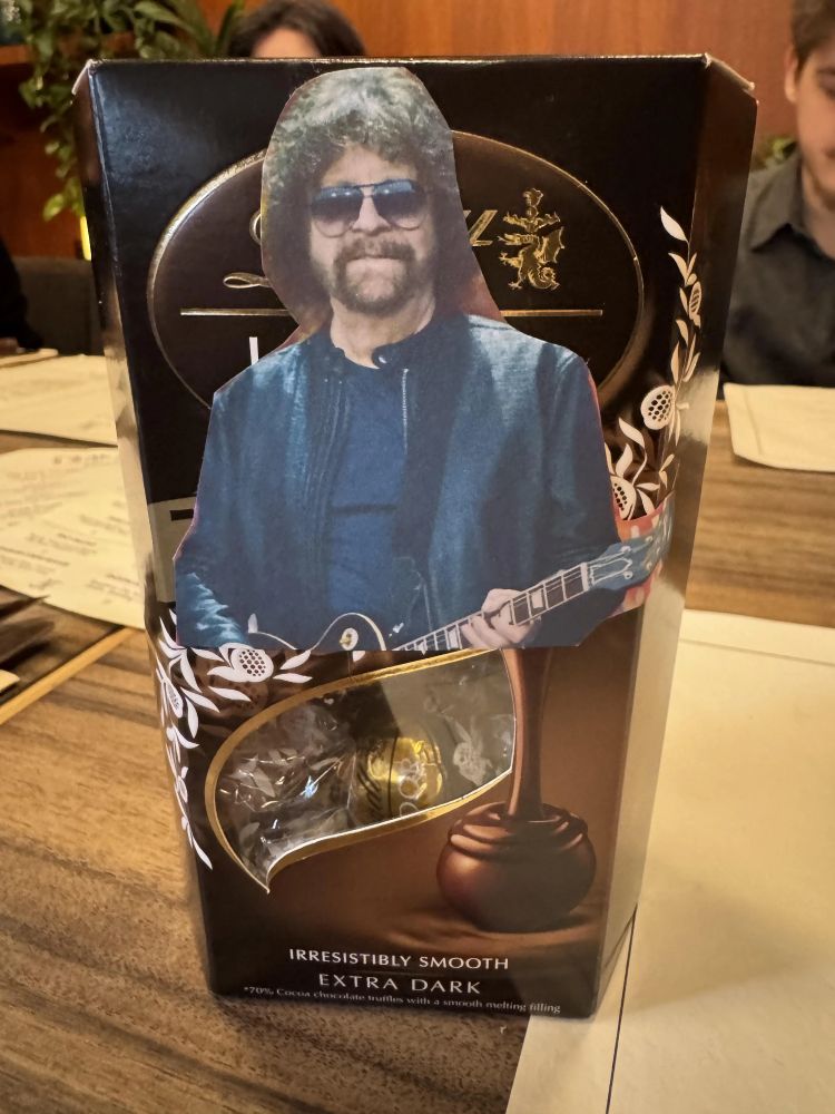 A photo of Jeff Lynne has been superimposed onto a box of Lindt chocolates. Jeff Lindt is the joke.