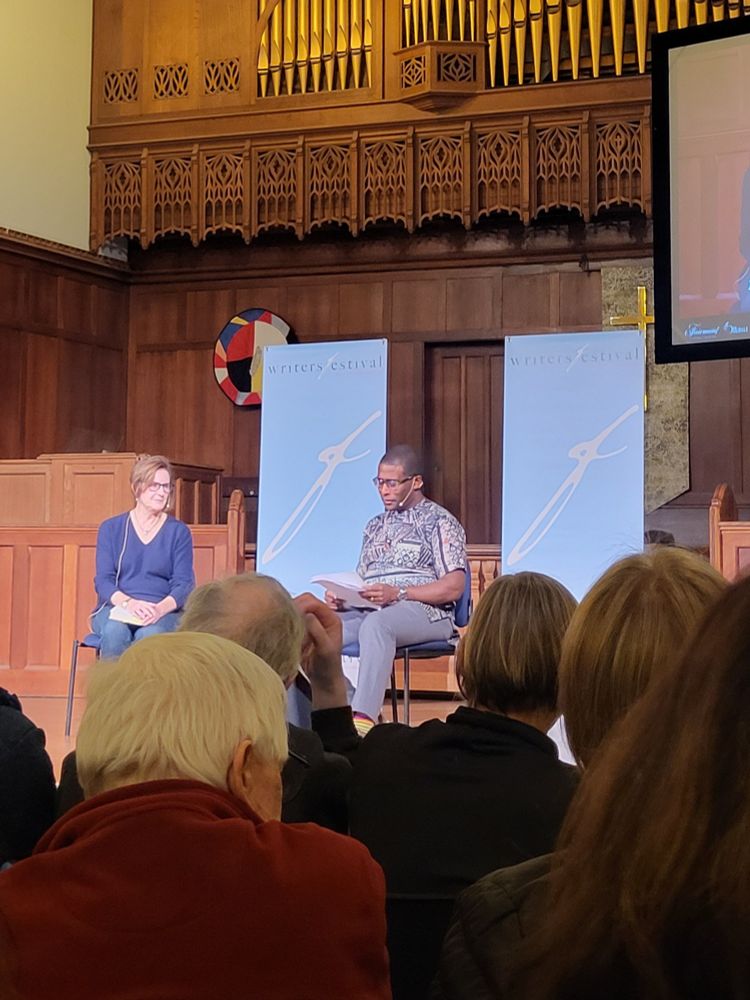 Carol Off and Adrian Harewood on stage for the Ottawa International Writer's Festival 