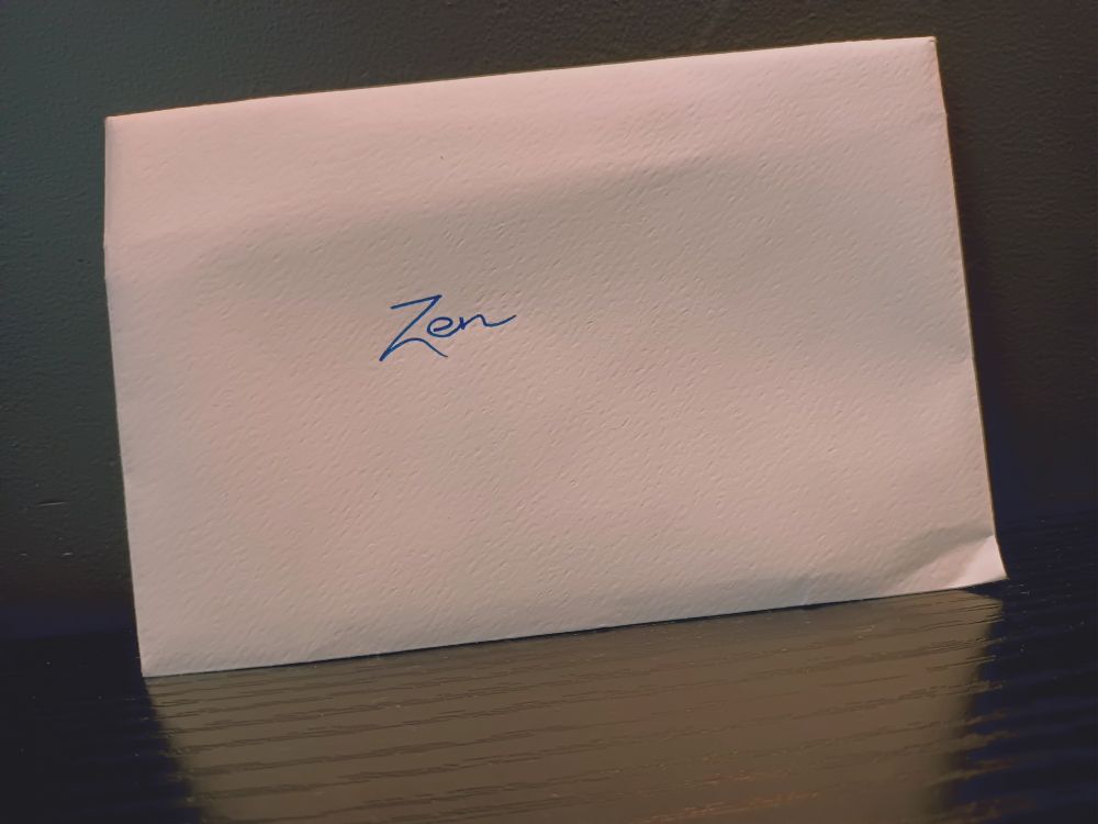envelope, handwritten on the front is the name " Zen"