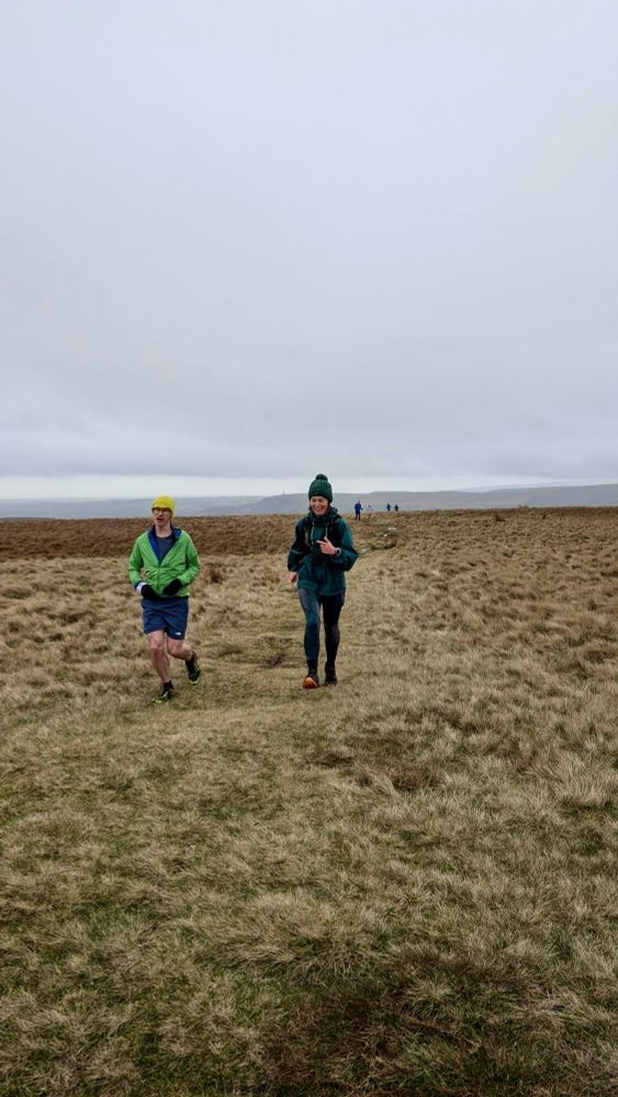 Eve and Sam running to the trig 