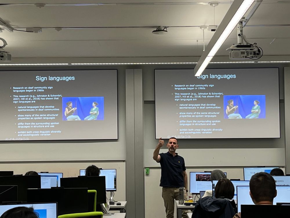 A photo of Adam teaching a session at the summer school
