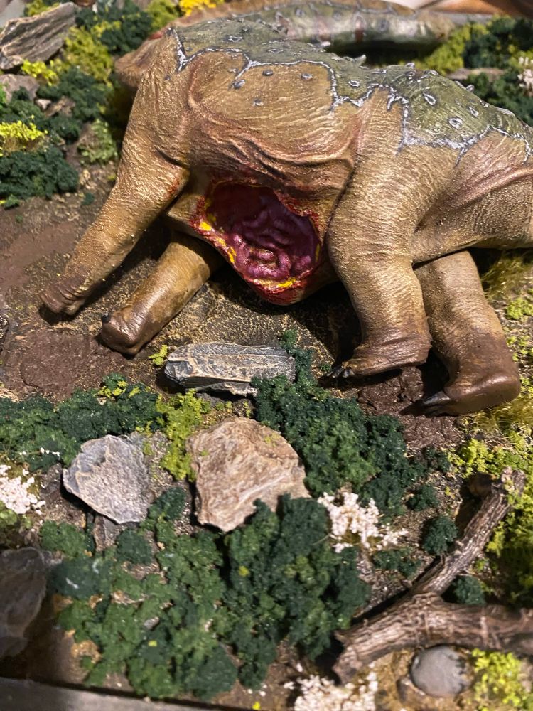 Fallen Sauropod on a verdant forest display base