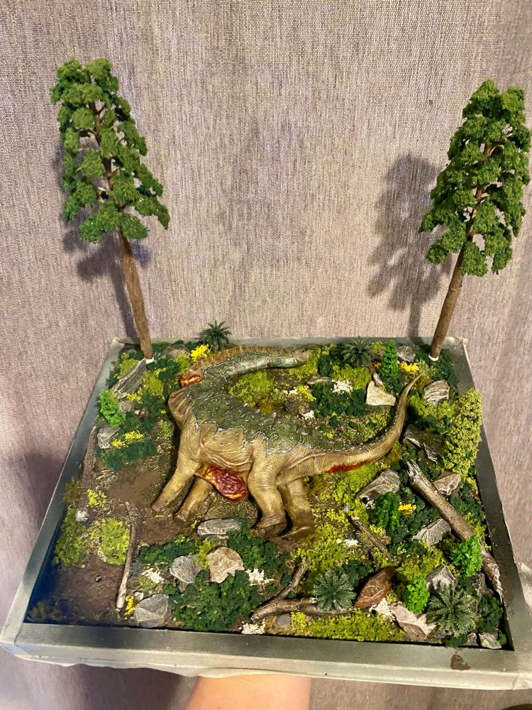 Fallen Sauropod on a verdant forest display base