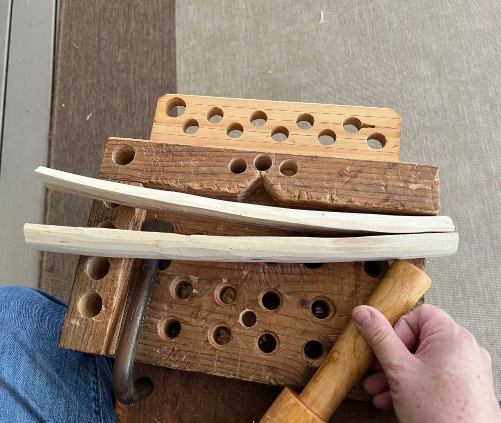 Here you can see how branch wood can change shape when split. The upper half relaxed into more of a curve. This will become two spoons, one carved pith up and the other pith down. 