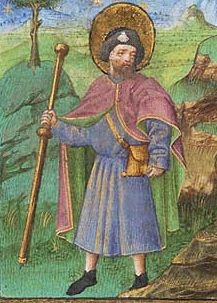 A pilgrim hikes with a classic pilgrim’s staff. It is long enough to allow two steps before it is picked up and placed. I sometimes refer to this as a “striding stick”  as the pendulum motion allows you to set a steady stride. 