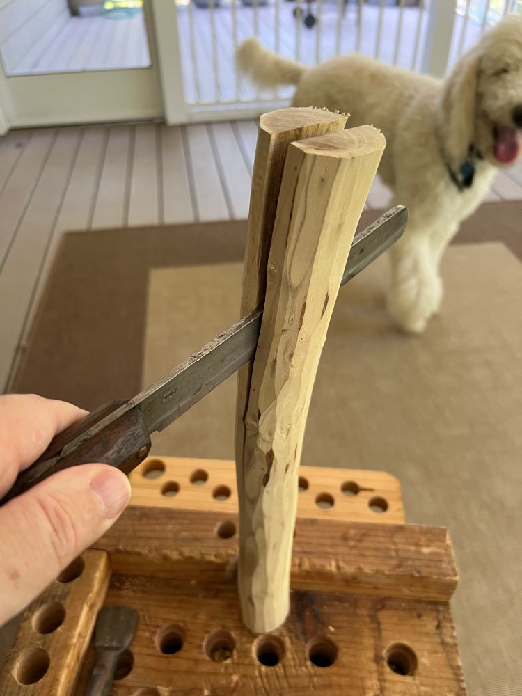 Starting the split with a Nata and mallet. Ideally the split follows the grain and doesn’t run into any knots. 