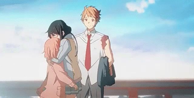 a man and a woman are hugging each other in a scene from an anime .