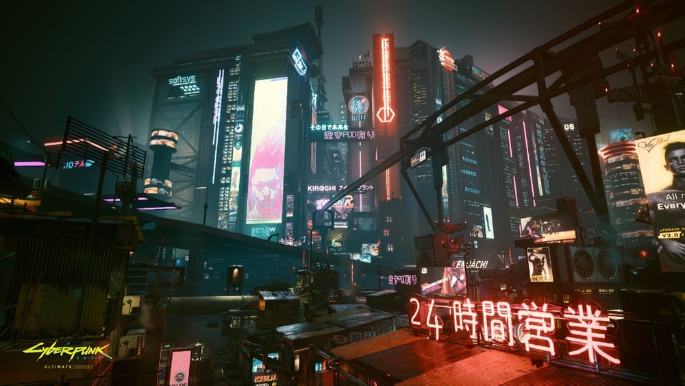 Neon-lit buildings tower over a ramshackle neighborhood built out of storage containers.