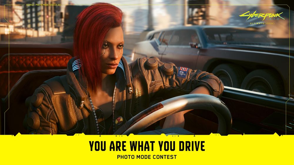 A screenshot from Cyberpunk 2077 showing female V in the driver’s seat of a convertible, one elbow casually leaning against the door. Text reads, “You Are What You Drive. Photo Mode Contest.” 
