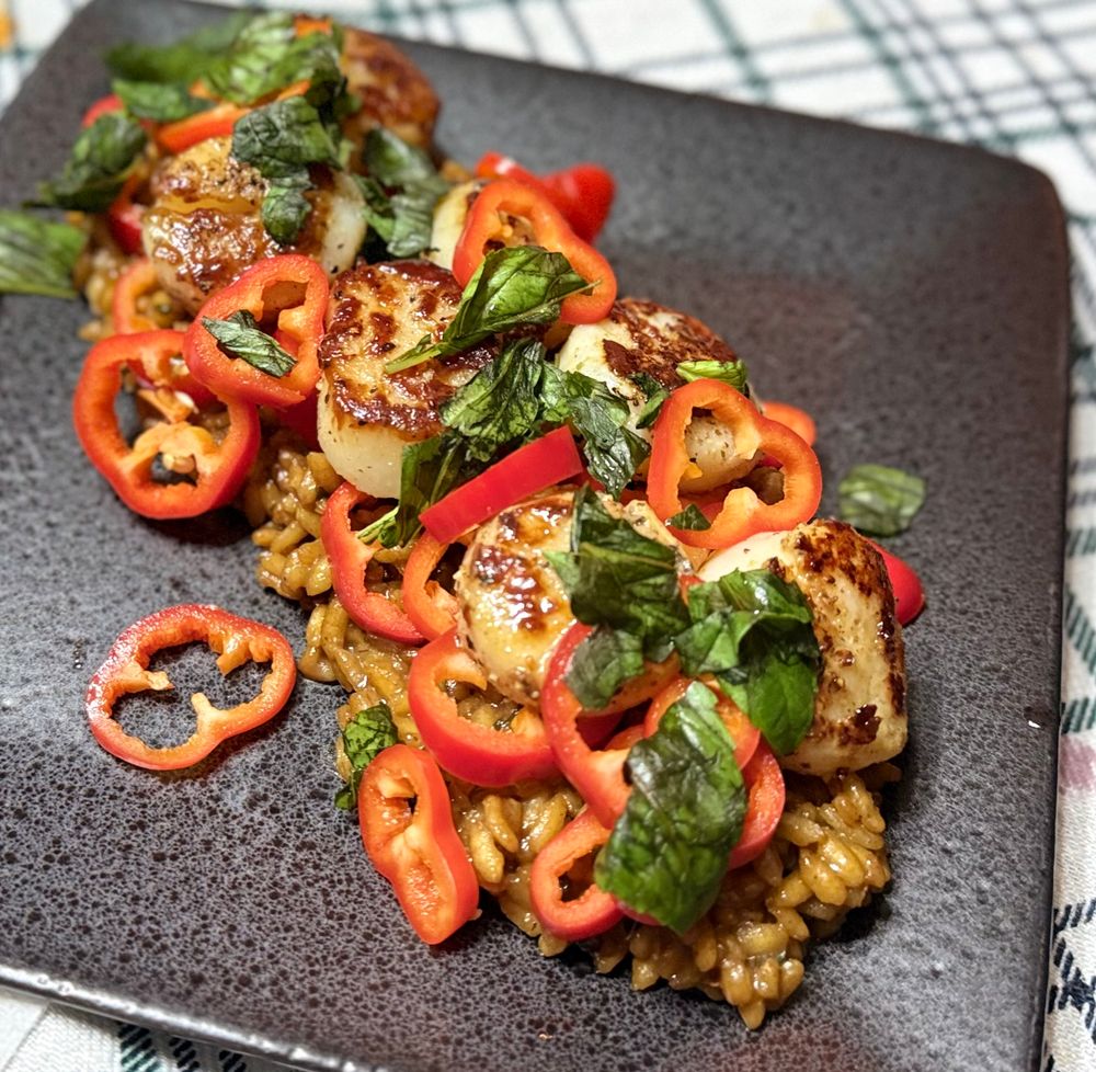 A simple risotto with perfect scallops, sweet peppers, and basil.