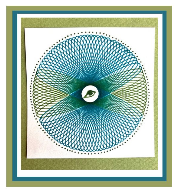 A Spirograph circle created of blue and olive green pen. An eye in the center of the shape.