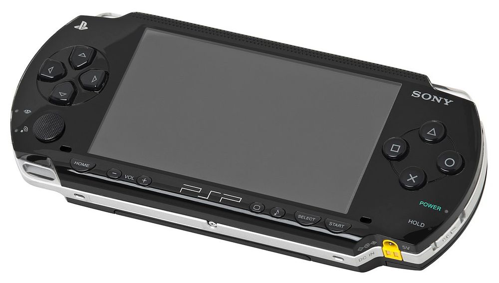 a black psp game console