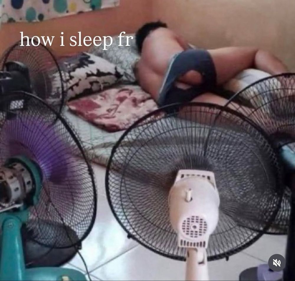 Guy sleeping with several fans on him in bed. Hole in underwear getting air on his ass. 