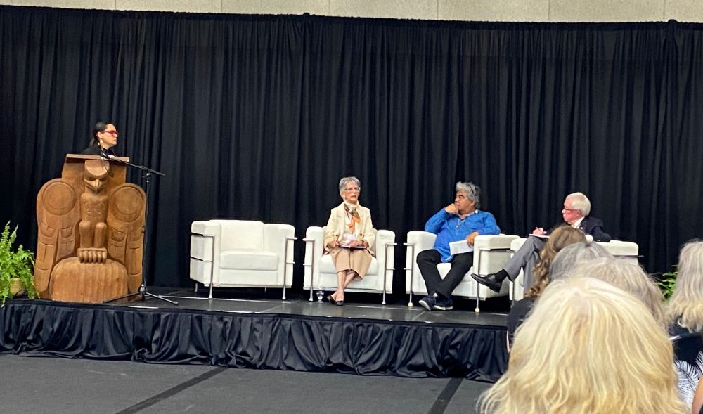 Nurjehan Mawani speaking on panel with Mikes Richardson, Rt. Hon. Joe Clark, & moderator Carol Ann Hilton 