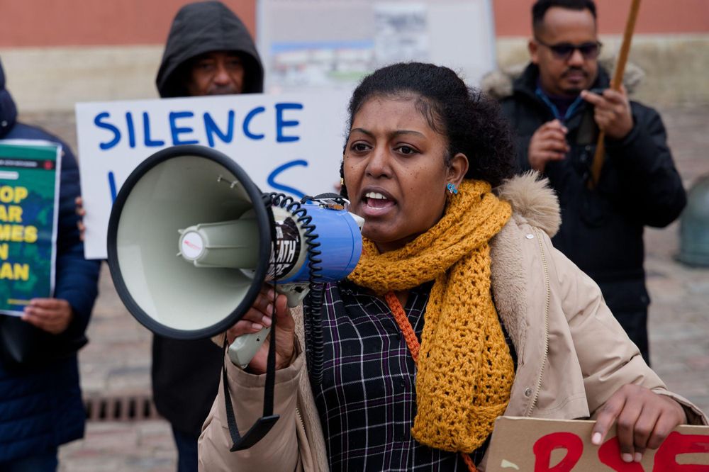 A person shouting through a mehaphone