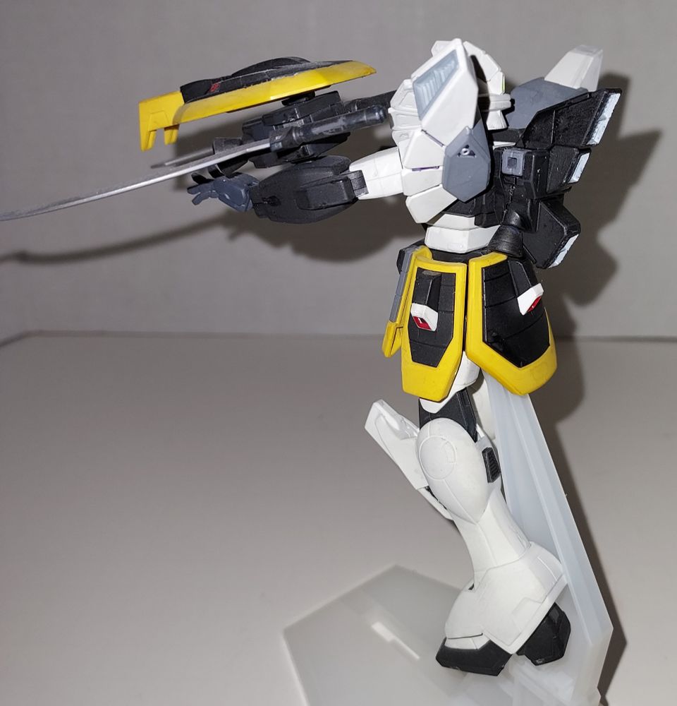 A side view of the kit, showing its space pack, the different thrusters in the shoulder, and the back waist/skirt part 