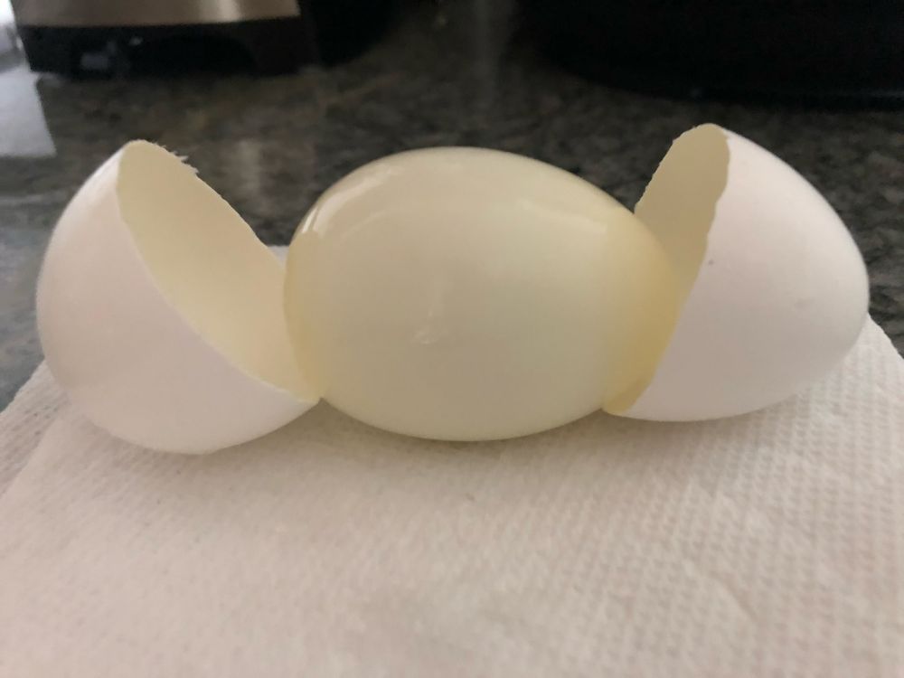 The perfect hard boiled egg with the shell cleanly broken into two halves