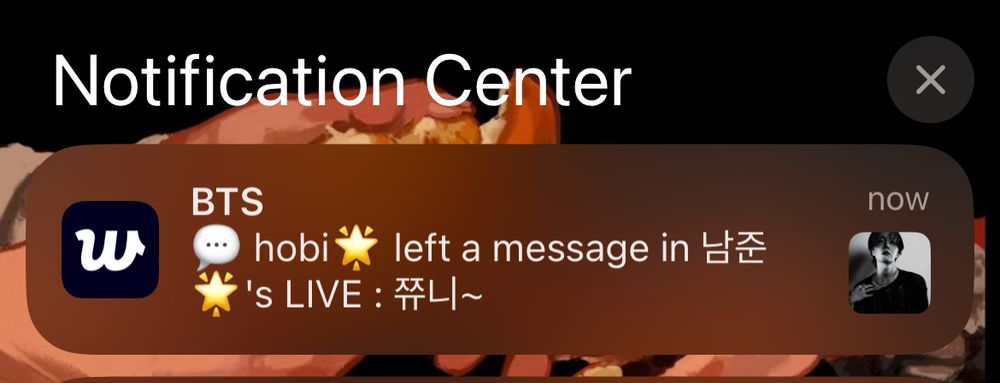 Screenshot of a weverse notification saying "hobi left a message in namjoon's live: 쮸니“