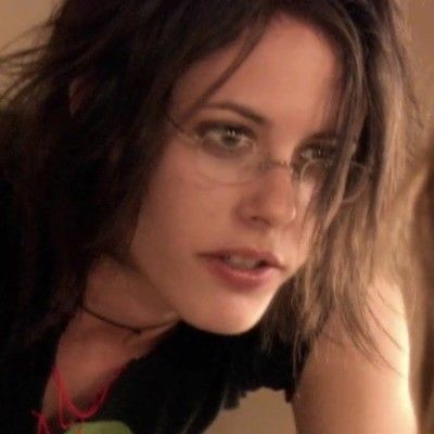 A picture of Shane from the L Word wearing a pair of frameless glasses similar to the ones Deluge is wearing.
