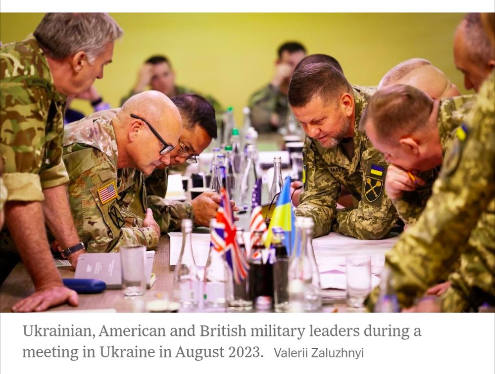 Was the photo really taken by valerii zaluzhnyi, one of the main protagonists in the story and someone who seems to be in the photograph?? did he use a timer? am I misreading the credit?