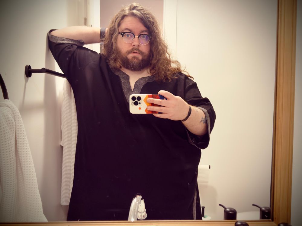 Mirror selfie in a tunic