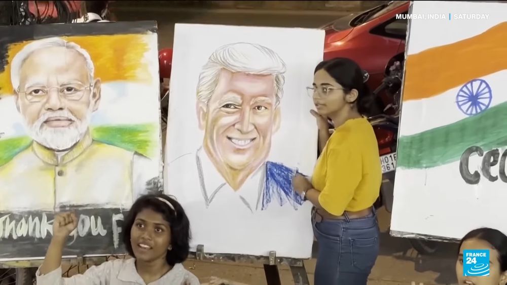 Portrait of Modi and Trump in Mumbai celebrating the ceasefire between India and Pakistan