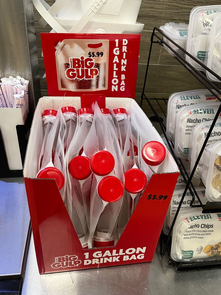 Big gulp 1 gallon drink bag. Big ole plastic bag with a red lid