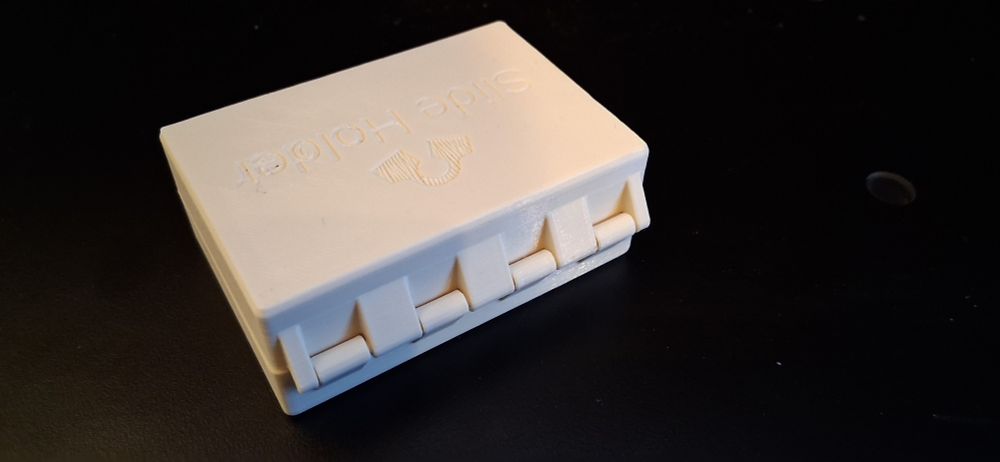 3D printed microscope slide holder. Closed, top-back view.