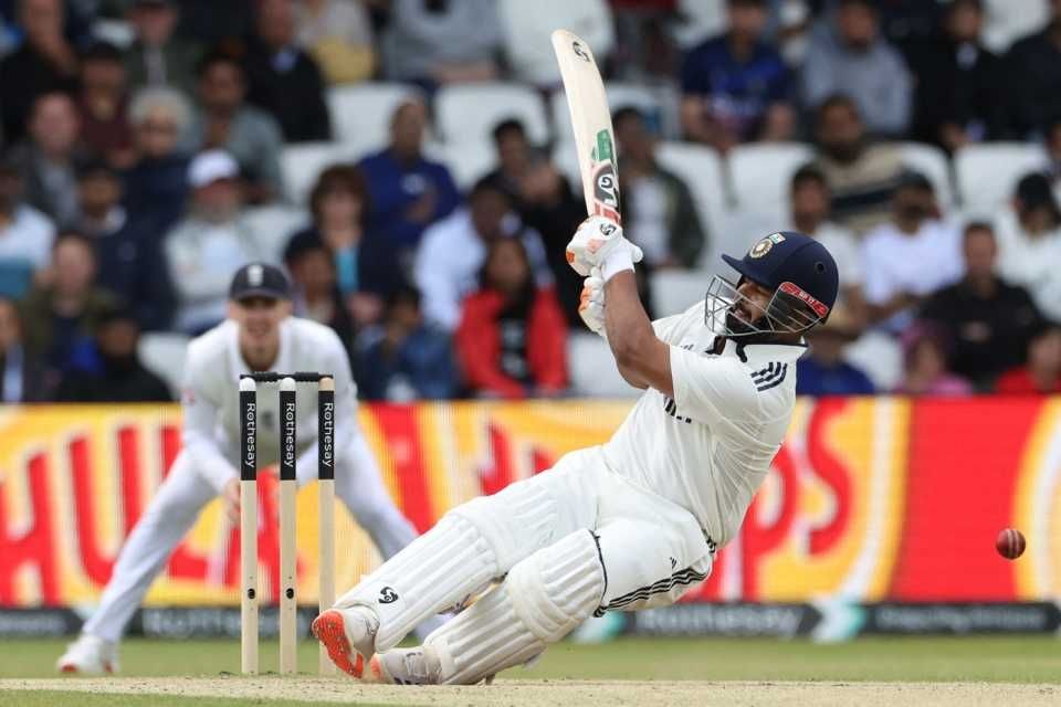 rishabh pant almost falling over during a sweep shot