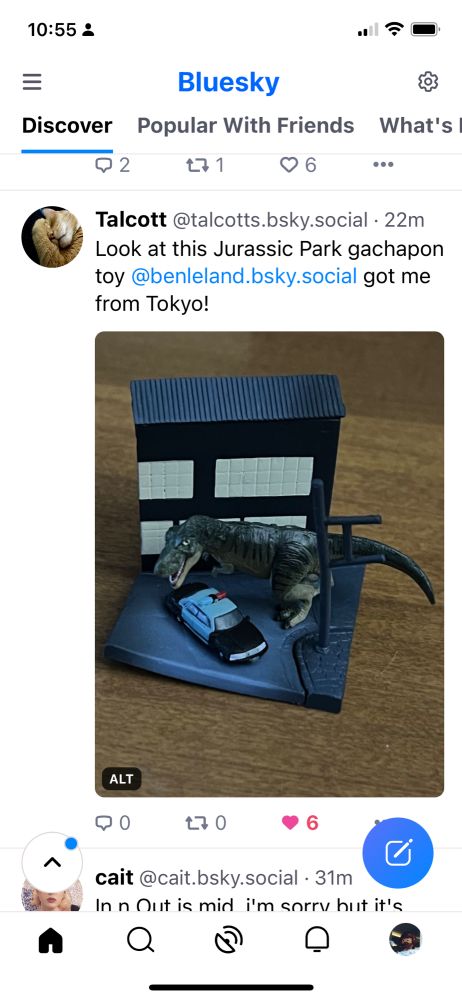 Post from talcotts.bsky.social with a photo of a Jurassic Park gachapon.