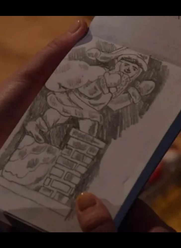 A horrible drawing of Santa going down a chimney 