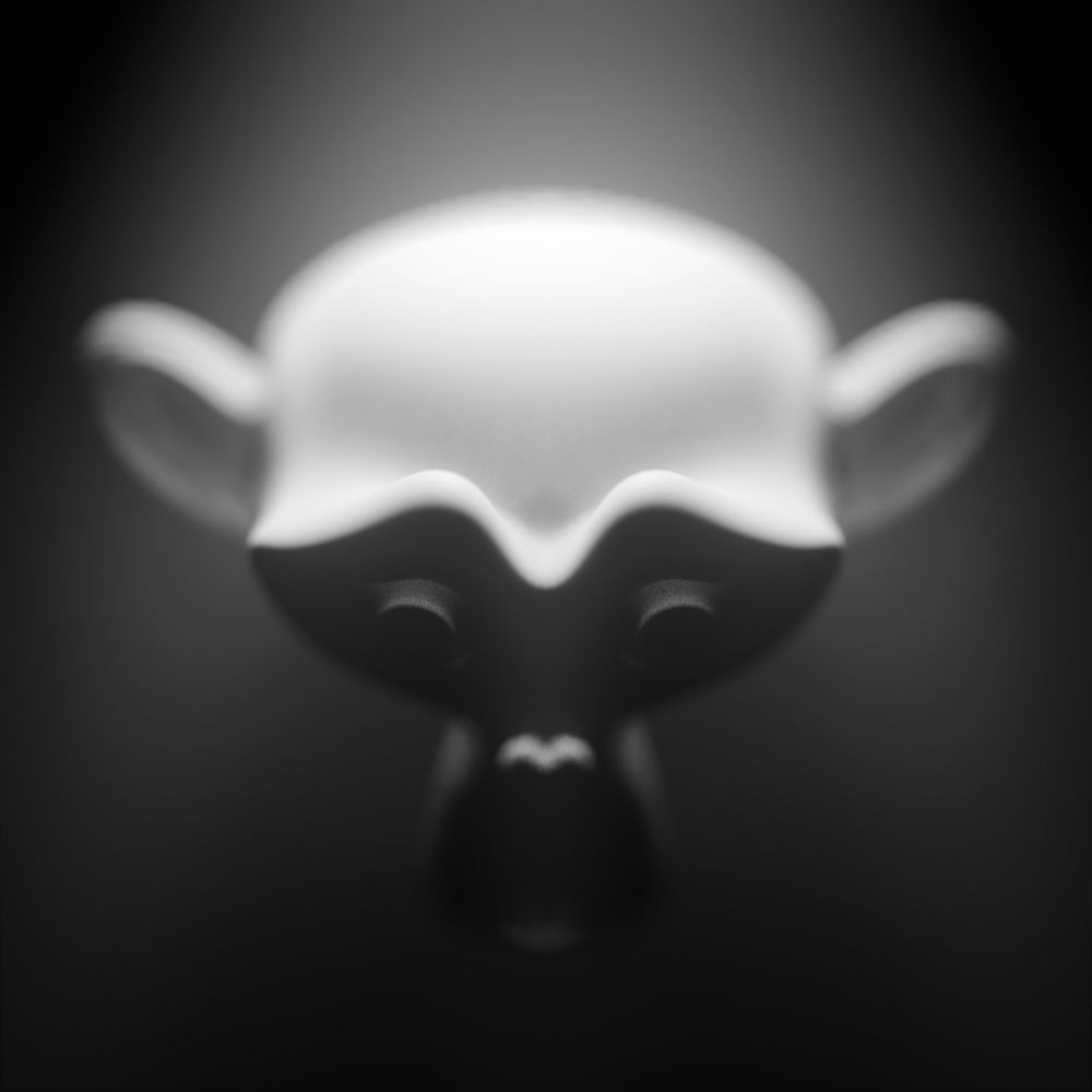 A monkey head harshly lit from above.
