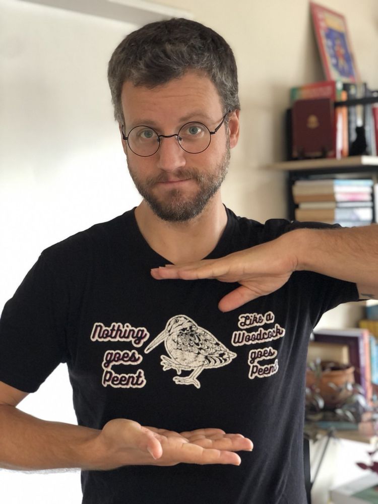 Me pointing to my shirt of a woodcock, which says Nothing goes Peent like a Woodcock goes Peent