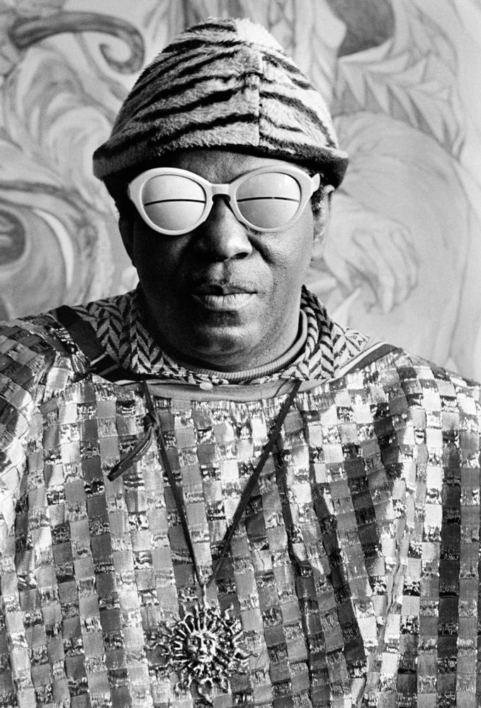 Photograph of musician Sun Ra in psychedelic outfit.