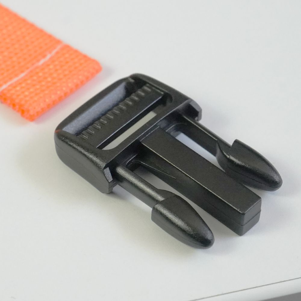 a plastic snap clip for a strap or belt. it has an uncanny resemblance to the previous picture of a spaceship for some reason. 