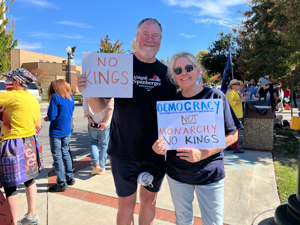 No Kings signs at NRV Indivisible No Kings “Democracy not Monarchy” 