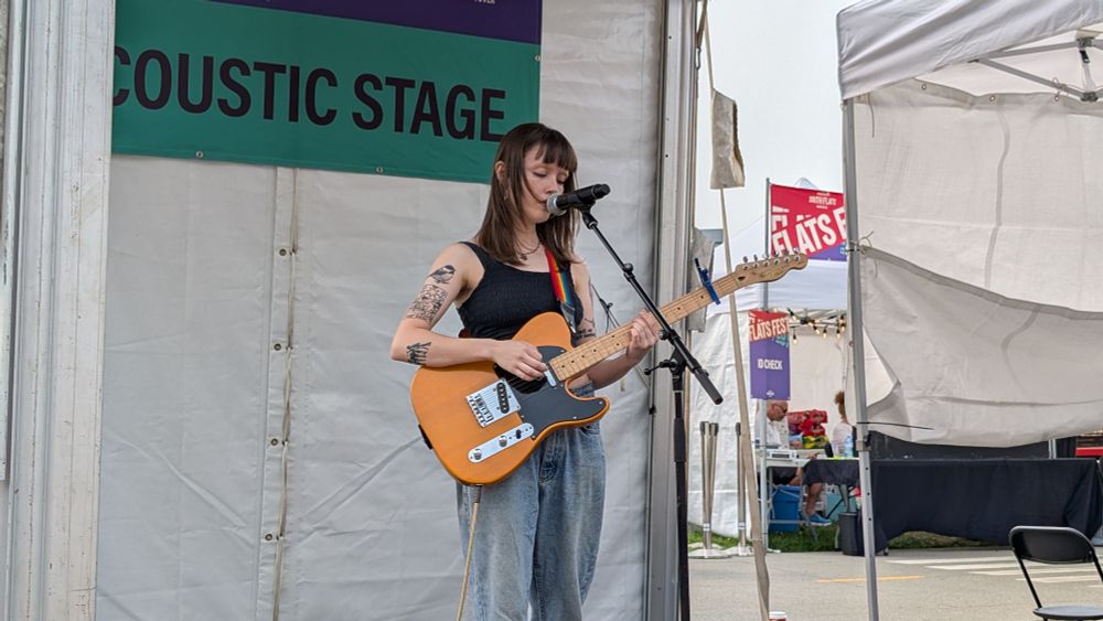 Kylie V on stage solo at Flats Fest